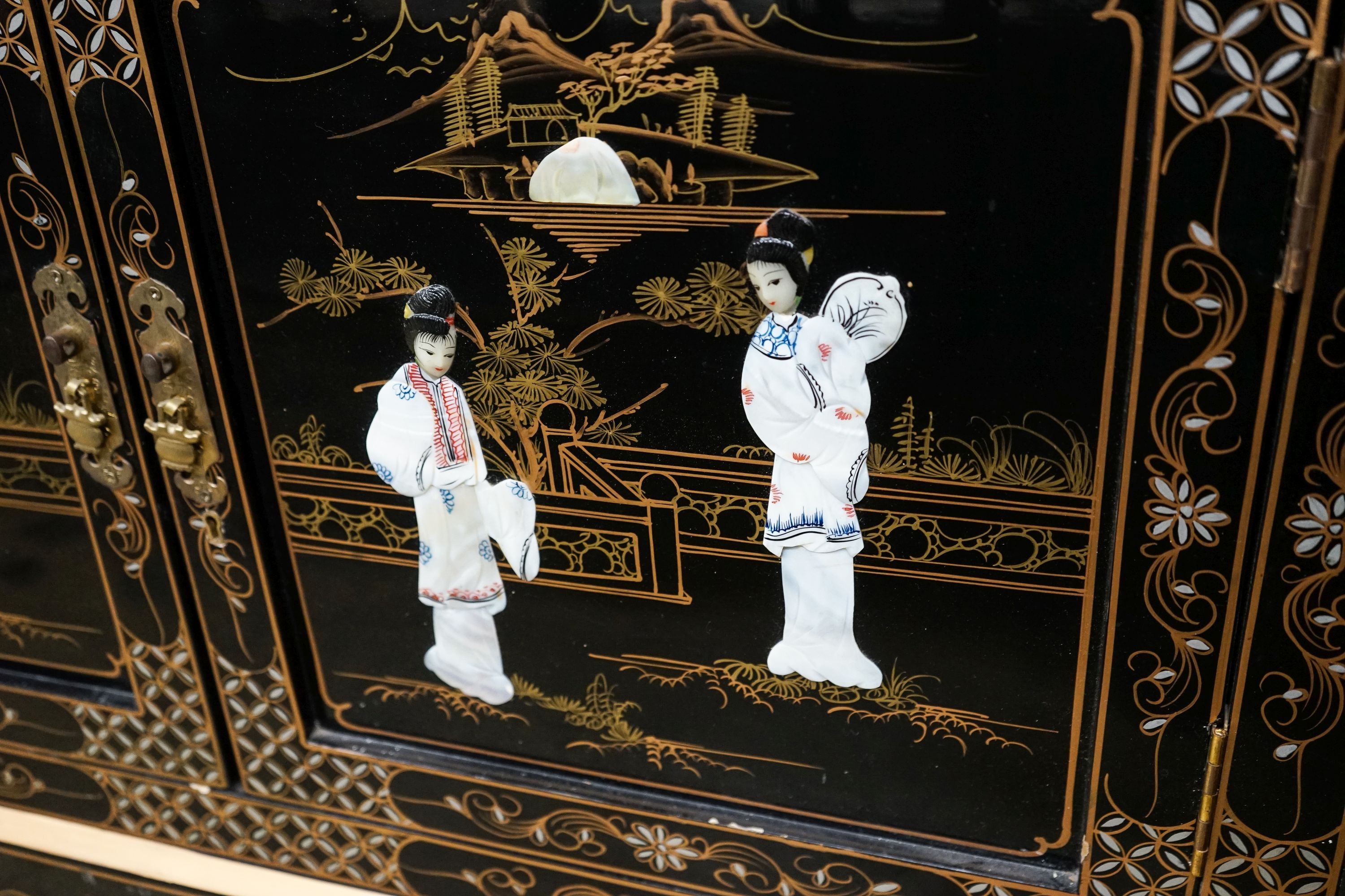 A Chinese style chinoiserie lacquer display cabinet with faux hardstone decoration, width 95cm, depth 38cm, height 183cm